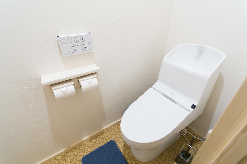 Guest House Yuyu Sapporo Esterno foto
