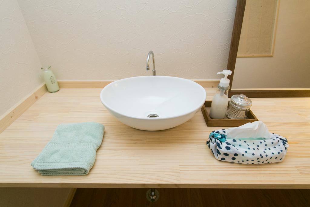 Guest House Yuyu Sapporo Esterno foto