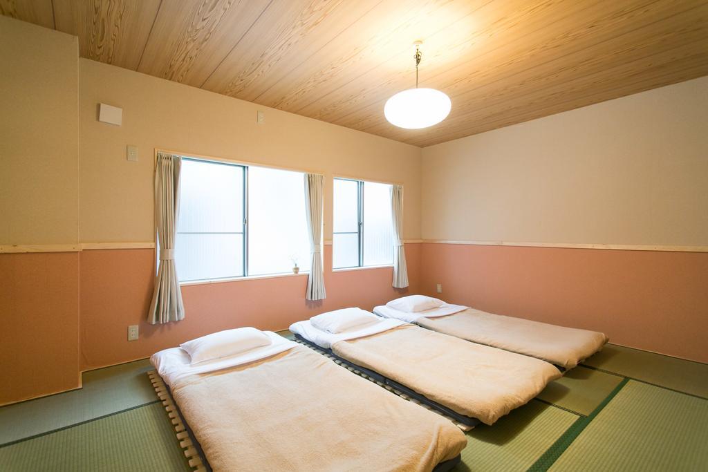 Guest House Yuyu Sapporo Esterno foto